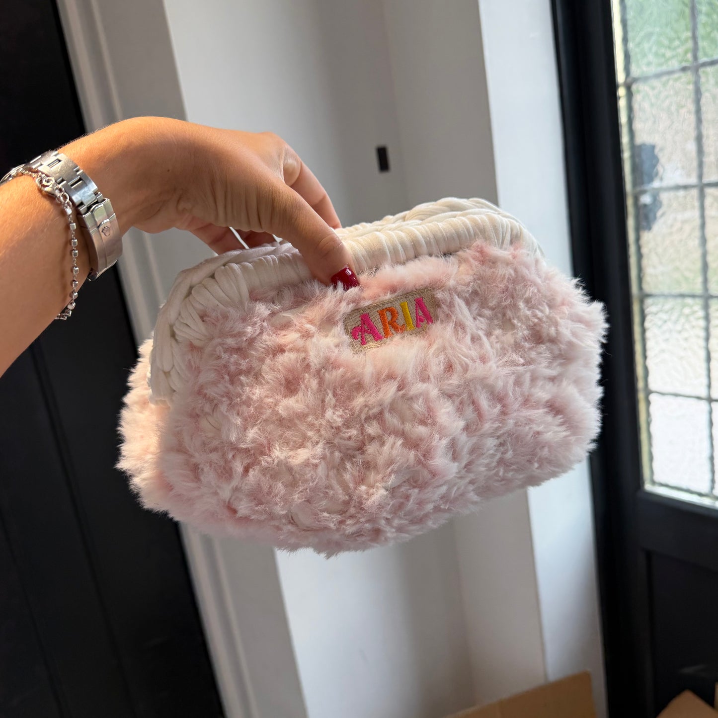 Baby pink clutch (white handle)